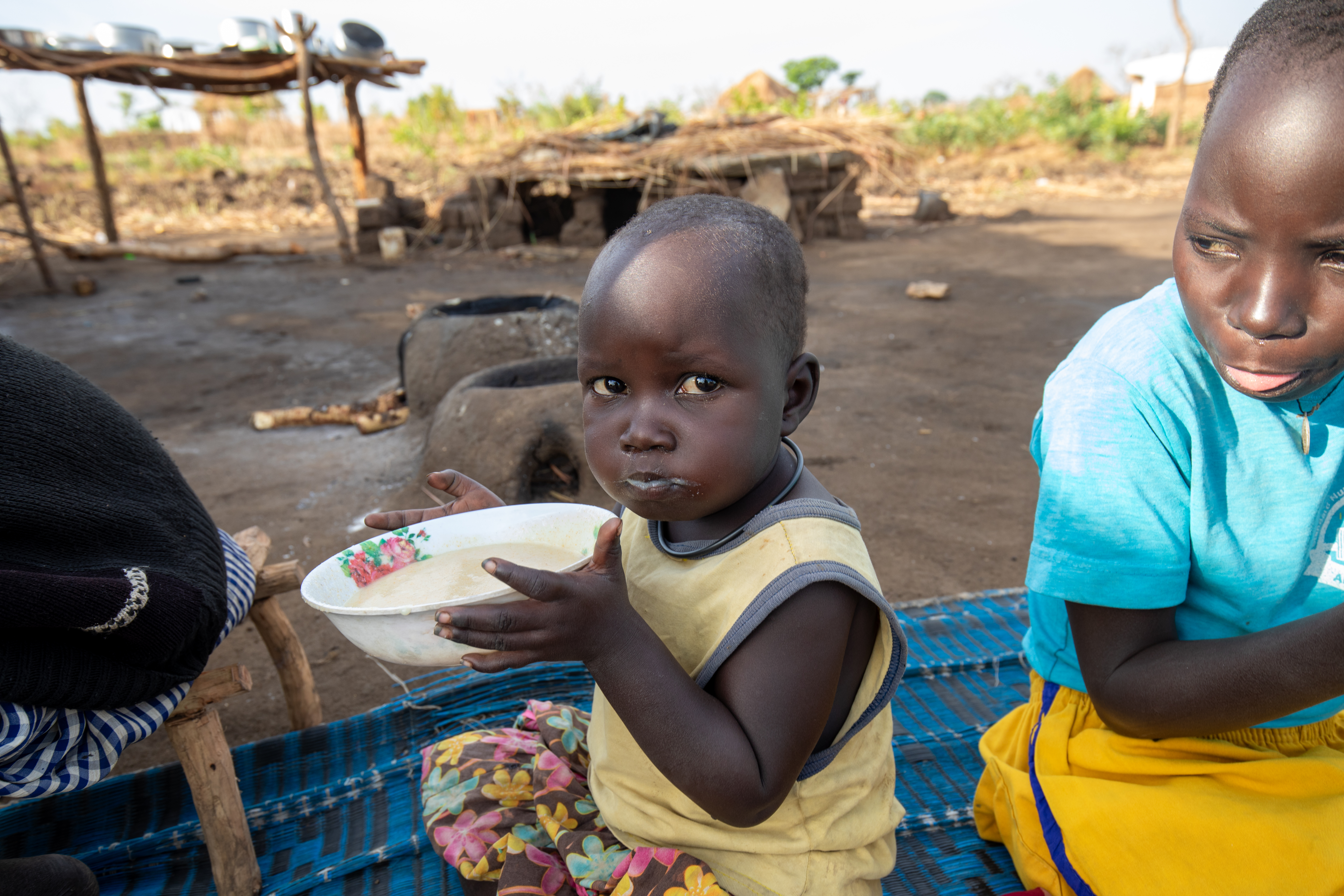 Refugee Child Eating