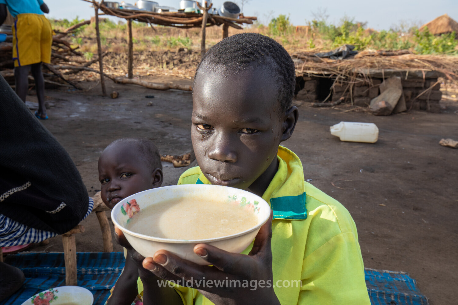 Refugee Child Eating