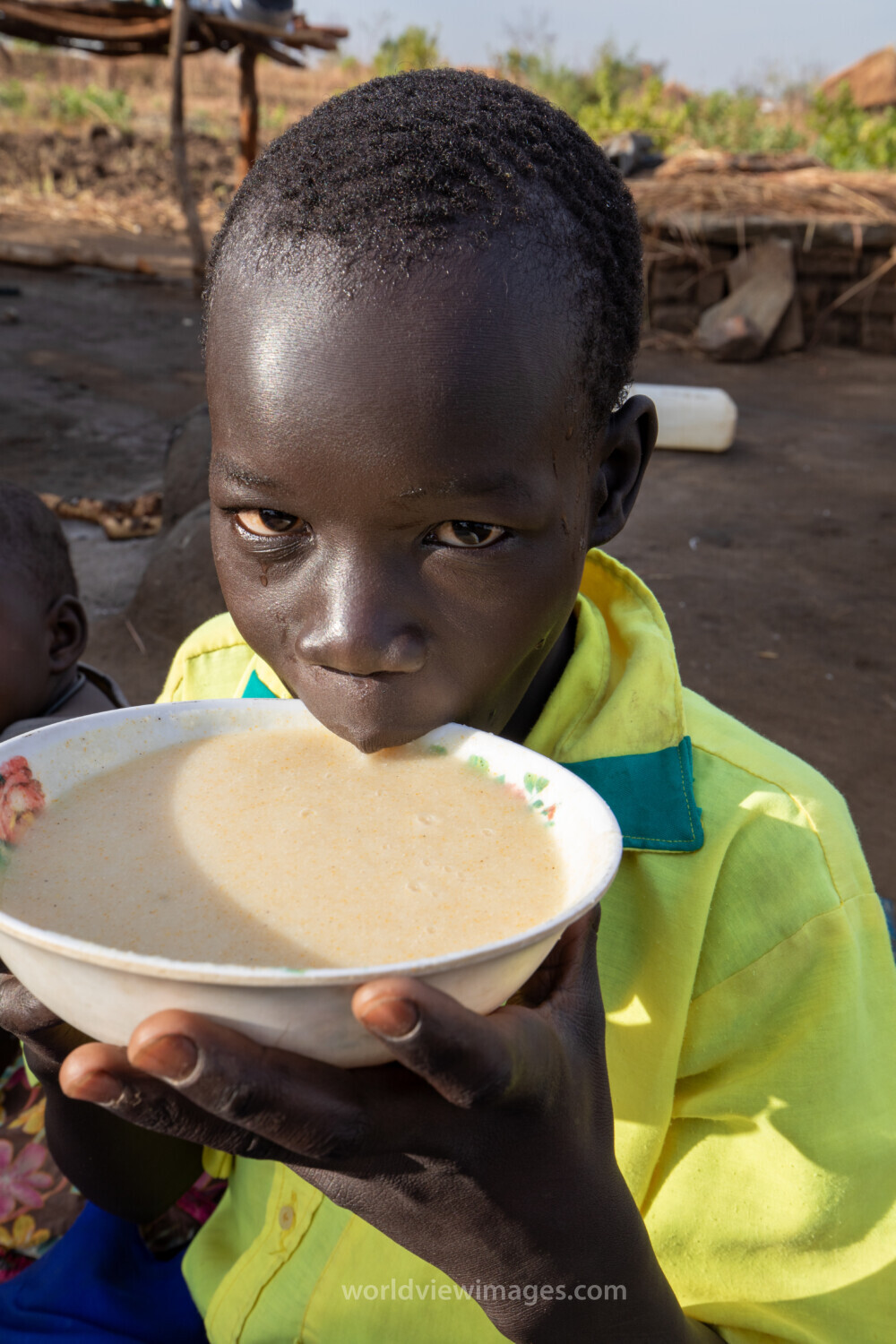 Refugee Child Eating