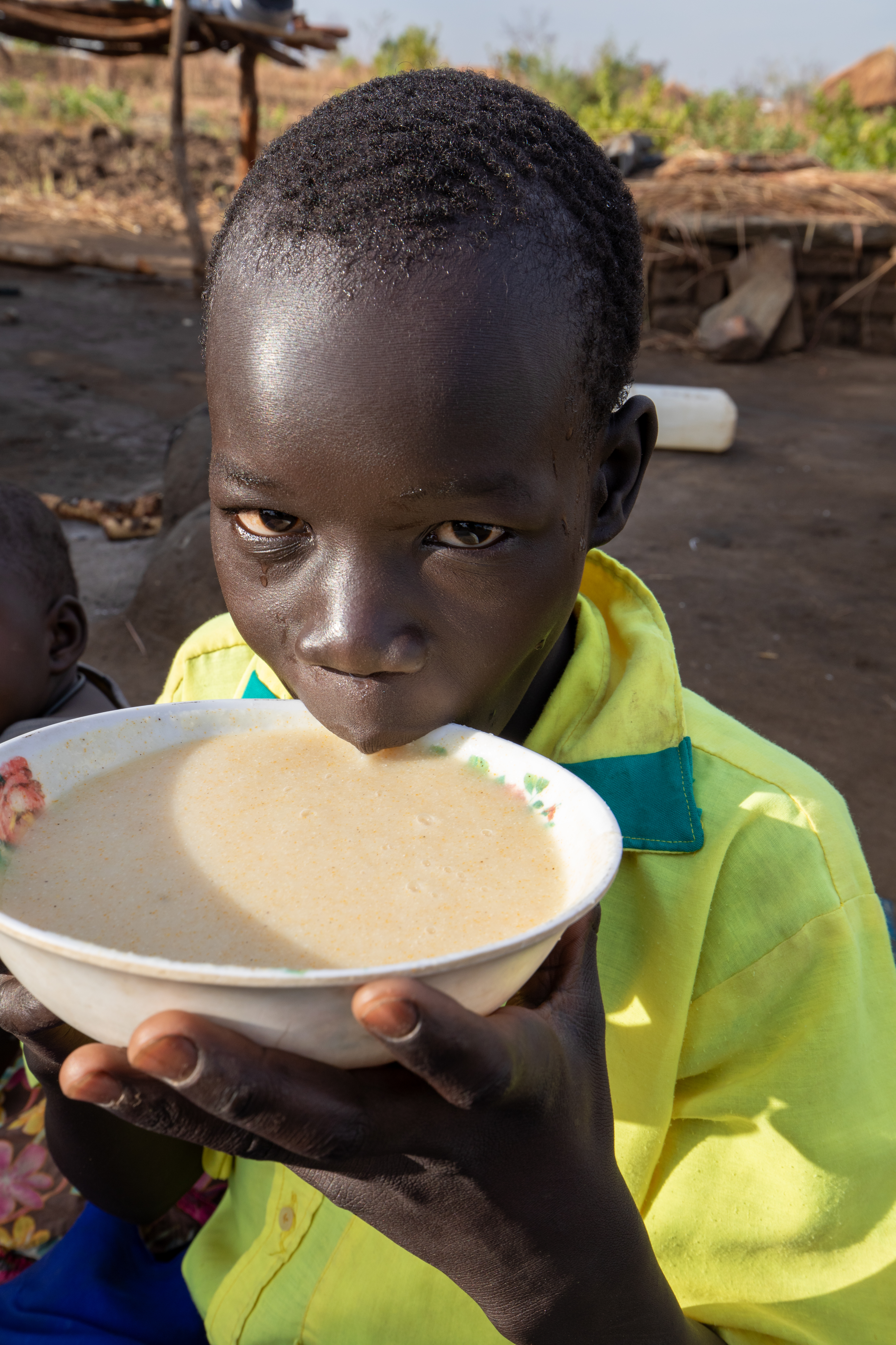 Refugee Child Eating