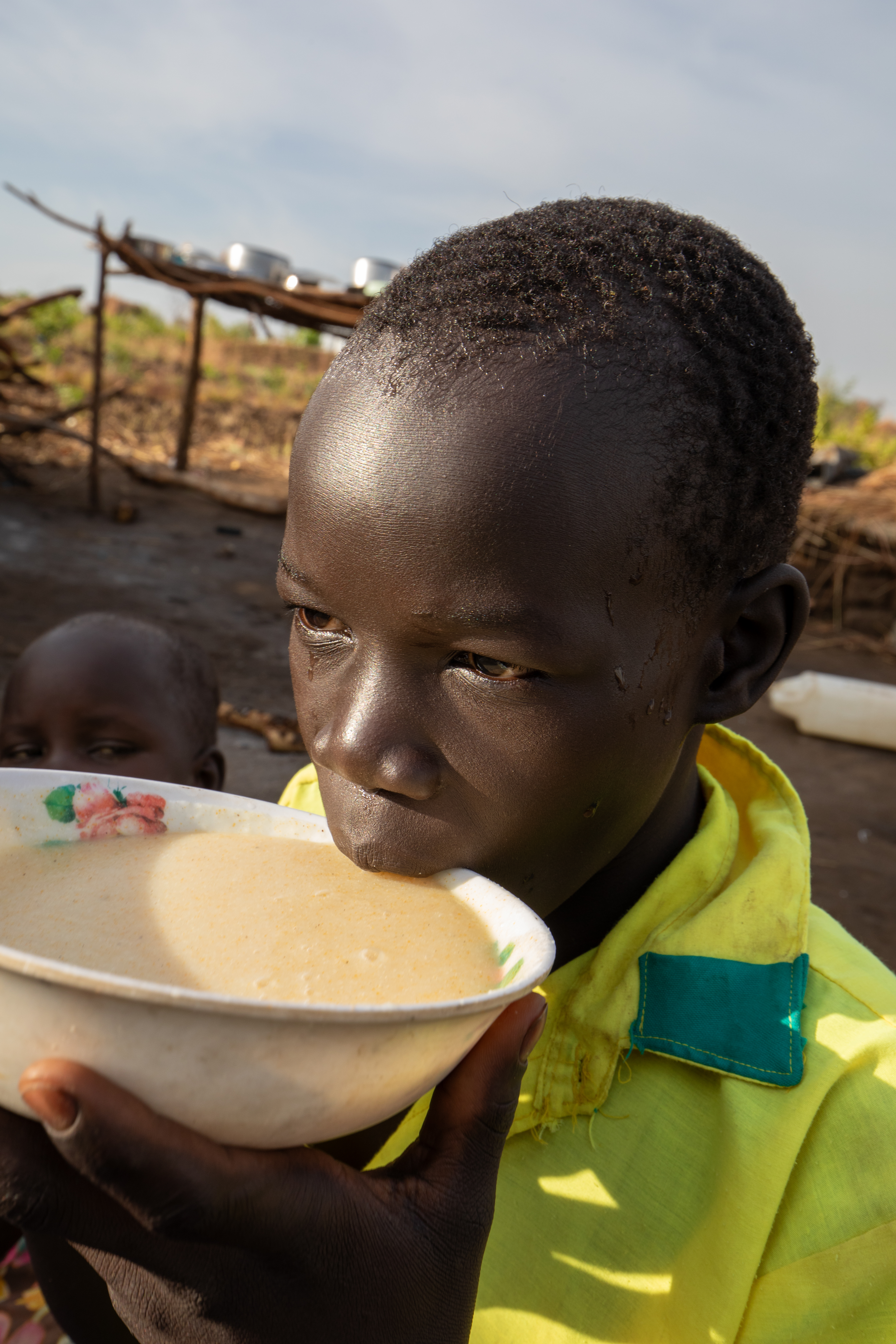 Refugee Child Eating