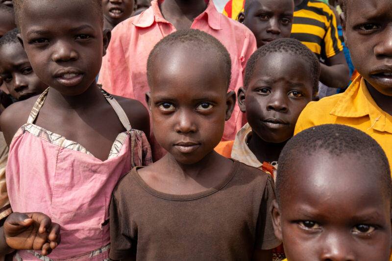 BidiBidi2017_0755 — Adult, Beard, Child, Eyes Open, Female