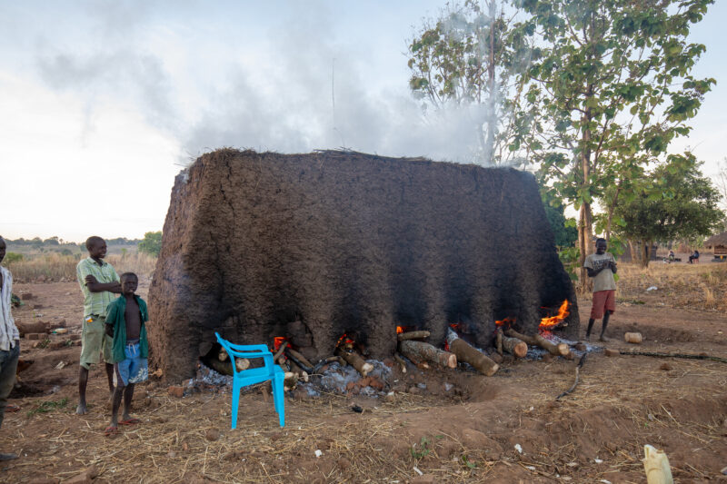 Making Bricks — Men harden mud bricks — Person, Refugee, Refugee Settlement, South Sudan