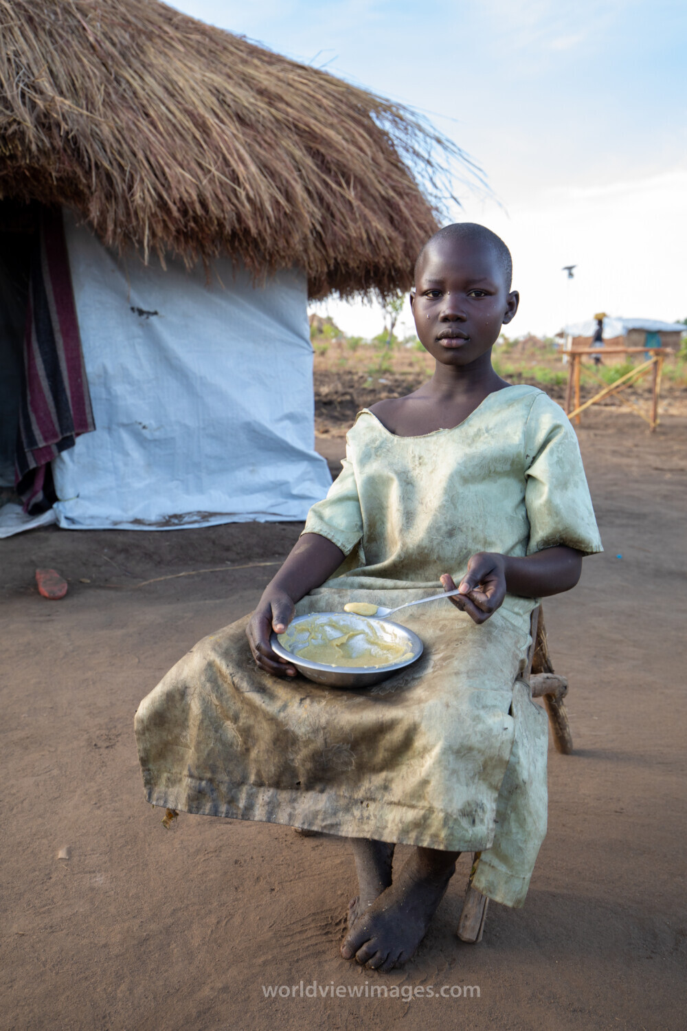 Refugee Child Eating