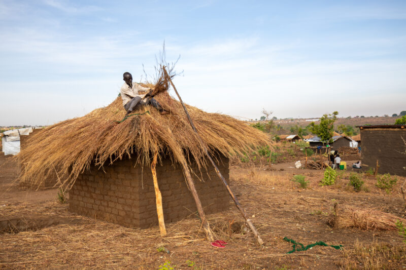 Building a House — Refugees from South Sudan build a small house in the Refugee Settlement that have been invited to by Uganda. — Complementary Colors, Refug...