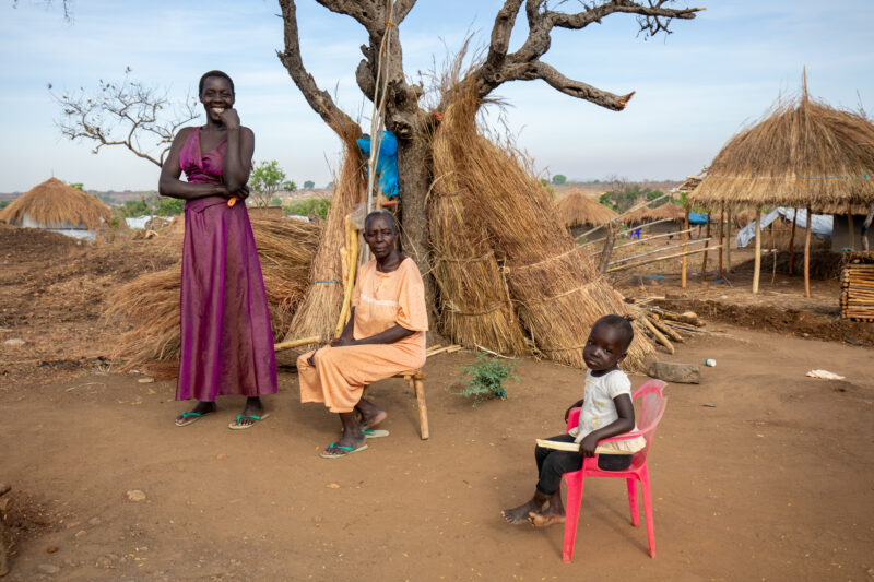 Refugee Housing — Refugees from South Sudan given a small plot of land in their host country of Uganda to build a small house. — Adult, Child, Elderly, Eyes ...
