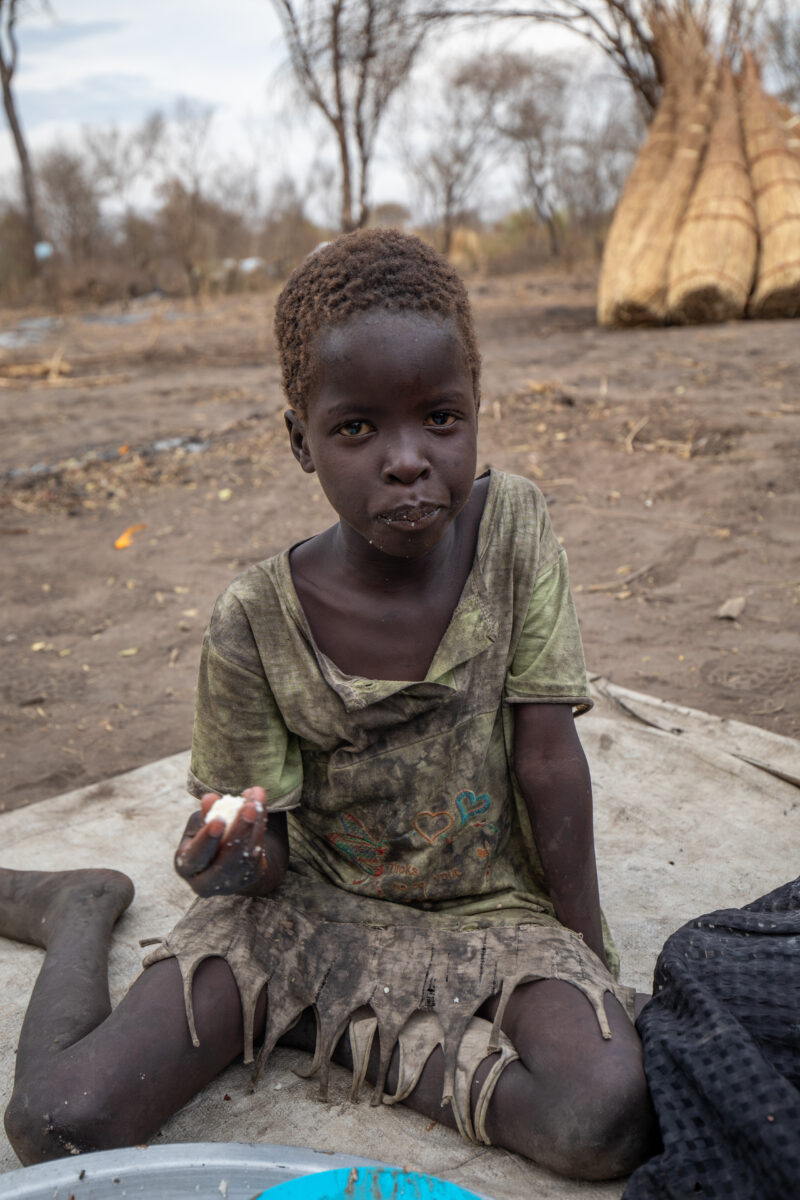 Refugees from South Sudan — After walking 100 Km, refugees arrive to the safety of Uganda. — Child, Eyes Open, Frontal Face, Male, One Face