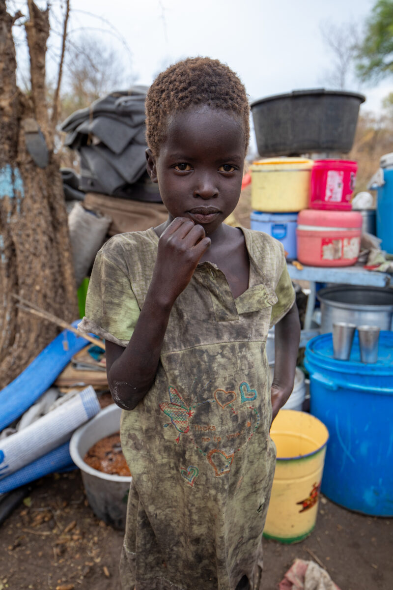 Refugees from South Sudan — After walking 100 Km, refugees arrive to the safety of Uganda. — Child, Eyes Open, Female, Frontal Face, One Face