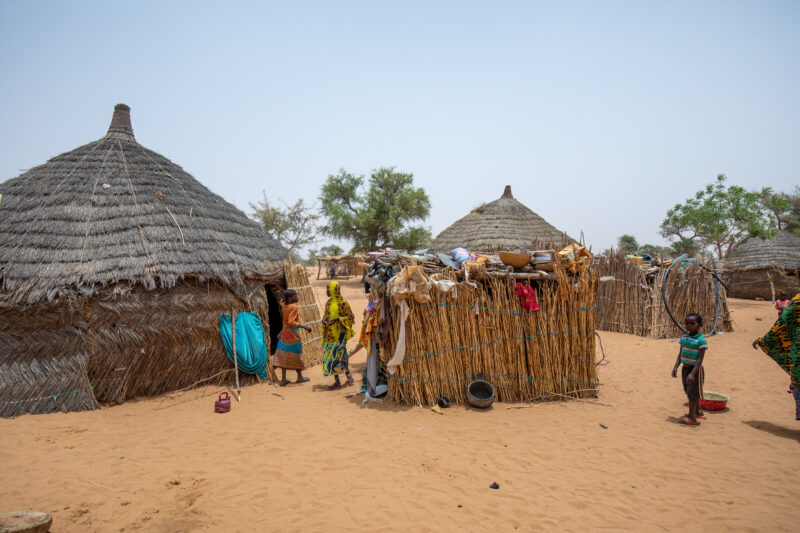 Rural Niger — Houses along the road in Niger, Africa — Africa, Child, Education, Eyes Open, Frontal Face