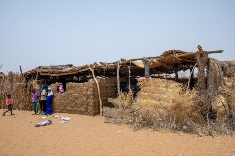 Rural School — Children stand outside their scholl in Rural Niger, Africa. — Africa, Architecture, Building, Desert, Education