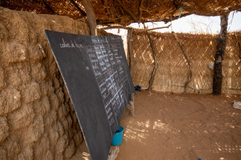 Temporary Classroom — Students in Niger, Africa, attend school in a classroom made of mud and sticks. — Africa, Education, Niger