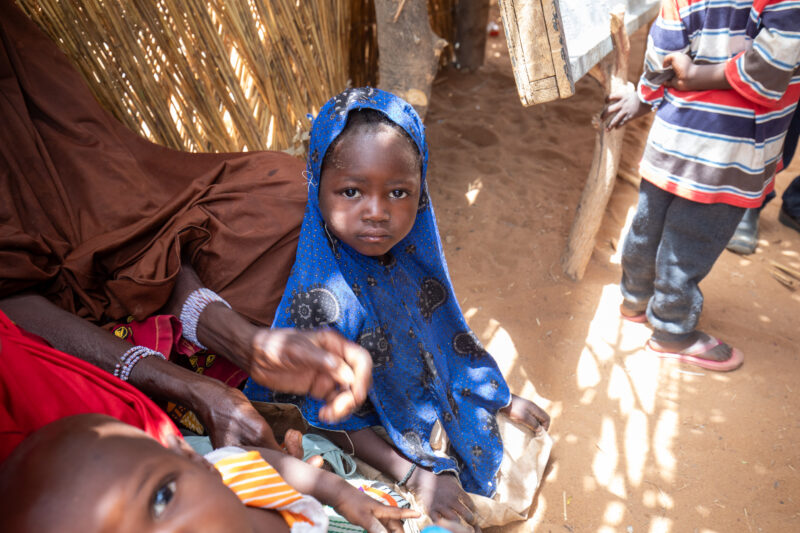 Temporary Classroom — Students in Niger, Africa, attend school in a classroom made of mud and sticks. — Africa, Child, Education, Eyes Open, Female