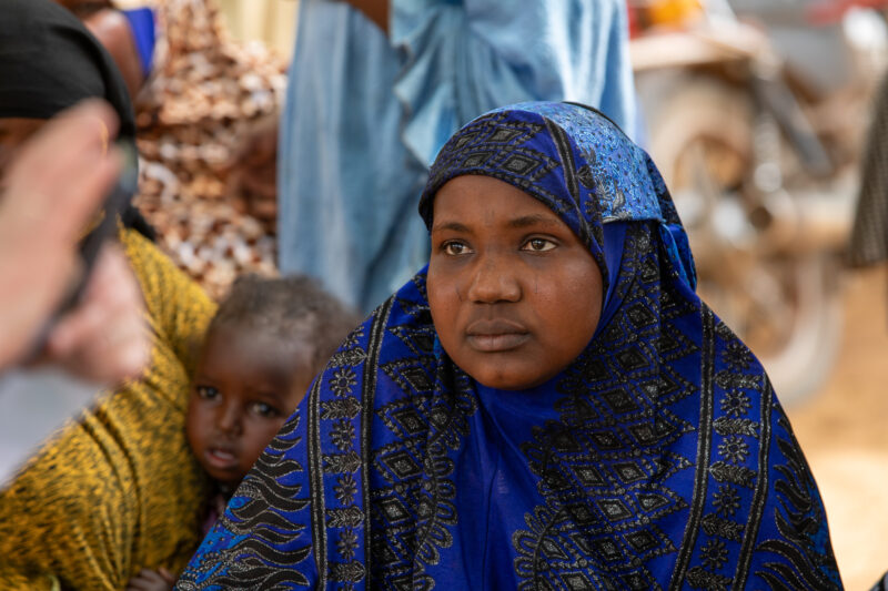 Parents Attend Meeting — Parents in Rural Niger attend a parrent teacher meeting. — Adult, Africa, Architecture, Building, Child