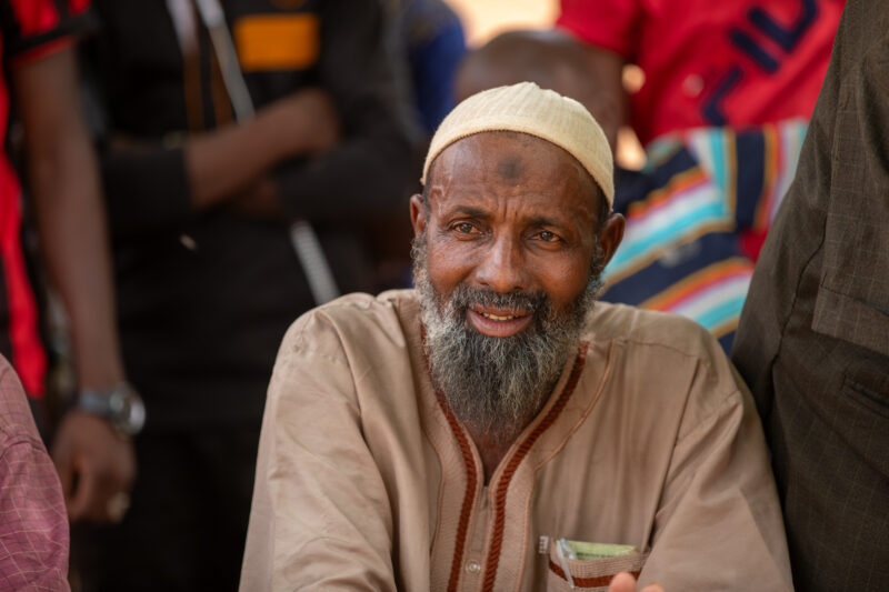 Parents Attend Meeting — Parents in Rural Niger attend a parrent teacher meeting. — Adult, Africa, Beard, Education, Eyes Open