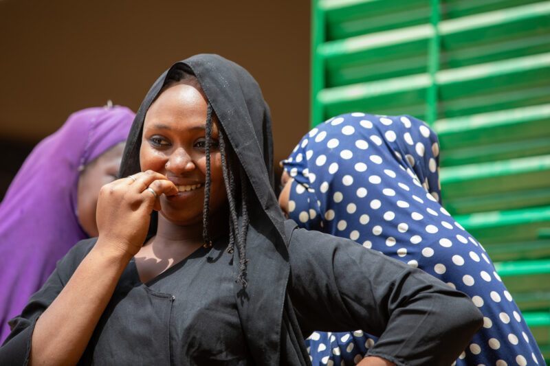 Students Outside their New School — Happy Student stand outside their new school provided by ADRA Norway — Adult, Africa, Complementary Colors, Education, Ey...