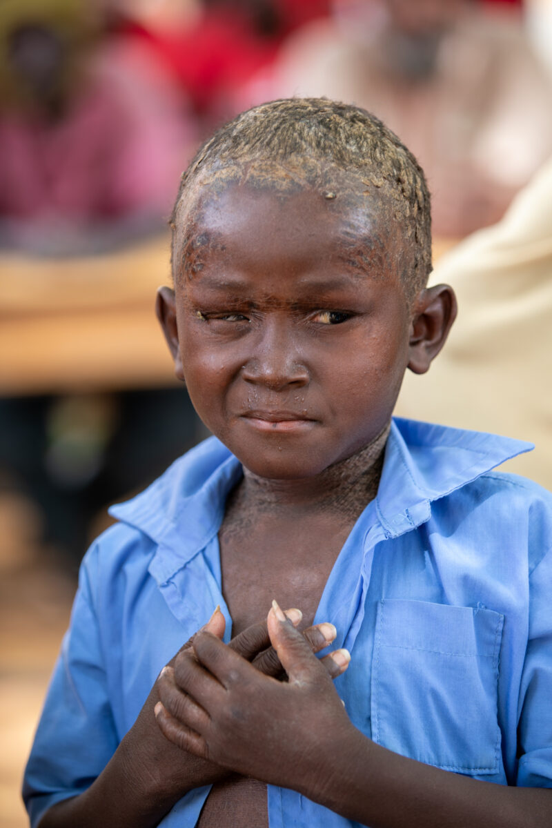 Students Outside their New School — Happy Student stand outside their new school provided by ADRA Norway — Africa, Close-Up, Complementary Colors, Education,...