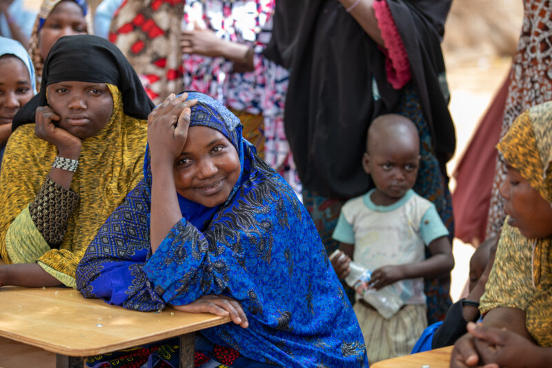 Parents Attend Meeting — Parents in Rural Niger attend a parrent teacher meeting. — Adult, Africa, Child, Education, Eyes Open