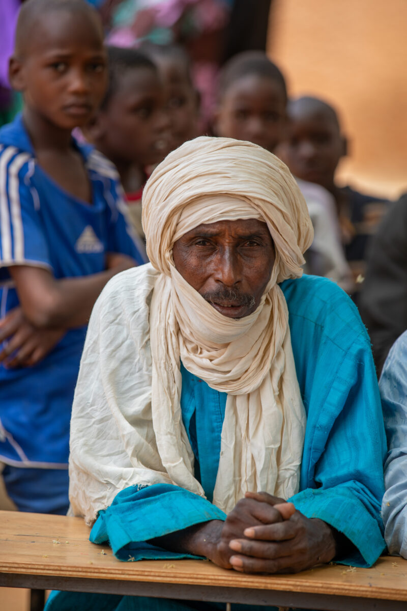 Parents Attend Meeting — Parents in Rural Niger attend a parrent teacher meeting. — Africa, Beard, Child, Education, Elderly