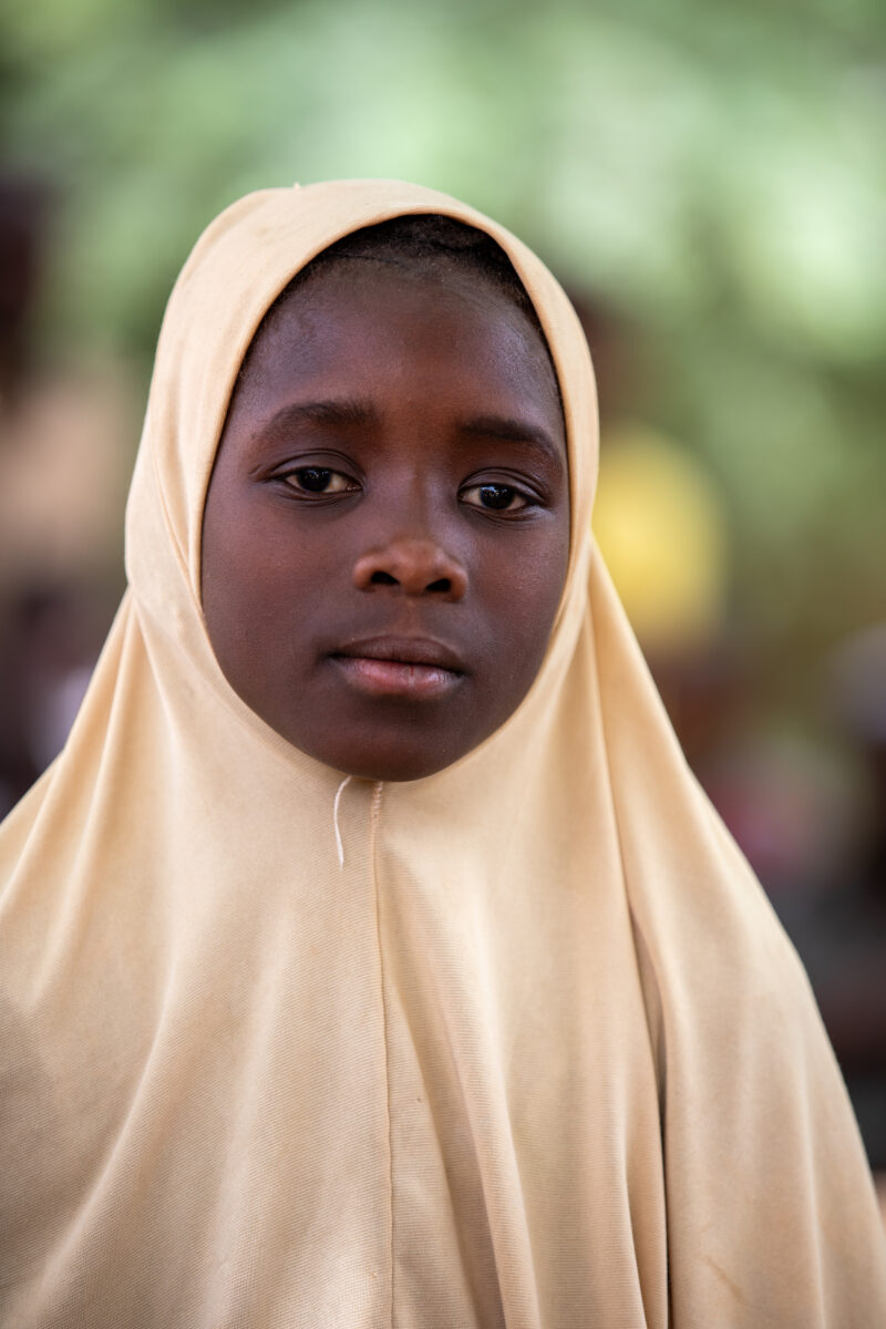 Students Outside their New School — Happy Student stand outside their new school provided by ADRA Norway — Adult, Africa, Close-Up, Education, Eyes Open