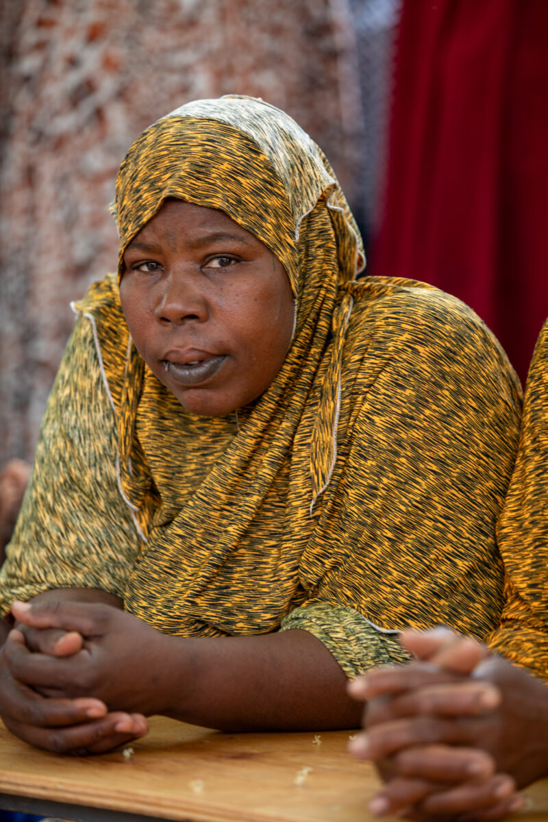 Parents Attend Meeting — Parents in Rural Niger attend a parrent teacher meeting. — Adult, Africa, Education, Eyes Open, Frontal Face