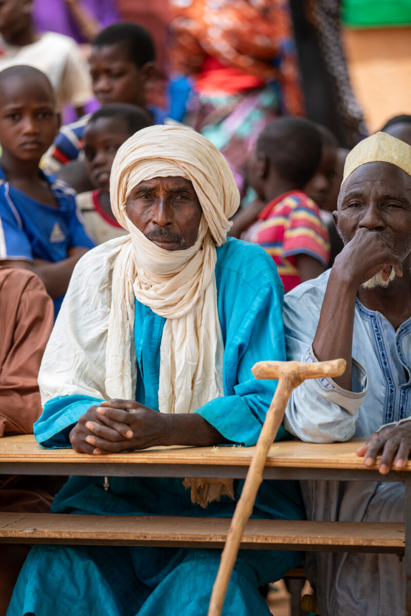 Parents Attend Meeting — Parents in Rural Niger attend a parrent teacher meeting. — Africa, Beard, Child, Education, Elderly