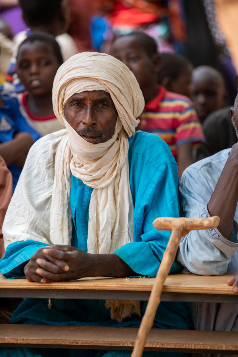 Parents Attend Meeting — Parents in Rural Niger attend a parrent teacher meeting. — Adult, Africa, Beard, Boat, Canoe
