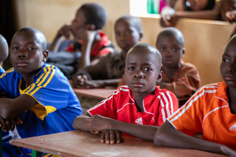 Boy in School in Niger — Young boy attends school in Niger, Africa — Adult, Africa, Beard, Education, Eyes Open