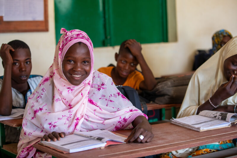 Girl in Niger Attends School — With a long tradition of early marriage, most girls in Niger drop out of school after the second grade — Adult, Africa, Beard,...