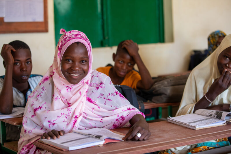 Girl in Niger Attends School — With a long tradition of early marriage, most girls in Niger drop out of school after the second grade — Adult, Africa, Educat...