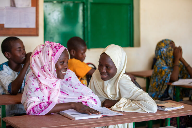 Girl in Niger Attends School — With a long tradition of early marriage, most girls in Niger drop out of school after the second grade — Adult, Africa, Educat...