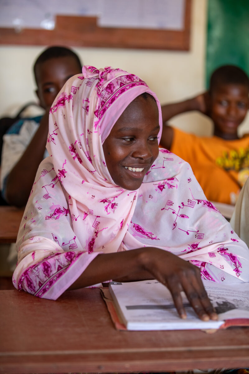 Girl in Niger Attends School — With a long tradition of early marriage, most girls in Niger drop out of school after the second grade — Adult, Africa, Educat...