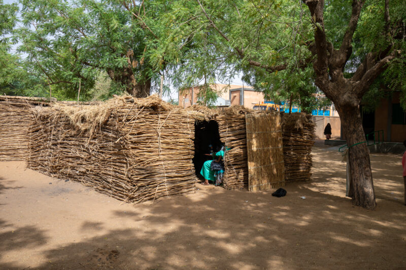 Temporary Classroom in Niger — Classroom made of reeds and mud provides a temporary solution while new schools can be built. — Africa, Education, Niger, Person