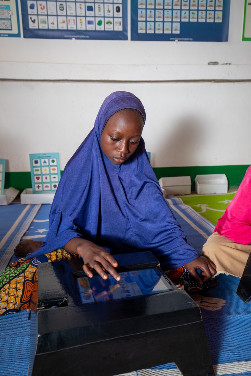 Computer Class in Niger — Young students in Niger learn computer skills on tablets provided to their school by Norway. — Africa, Child, Education, Eyes Close...
