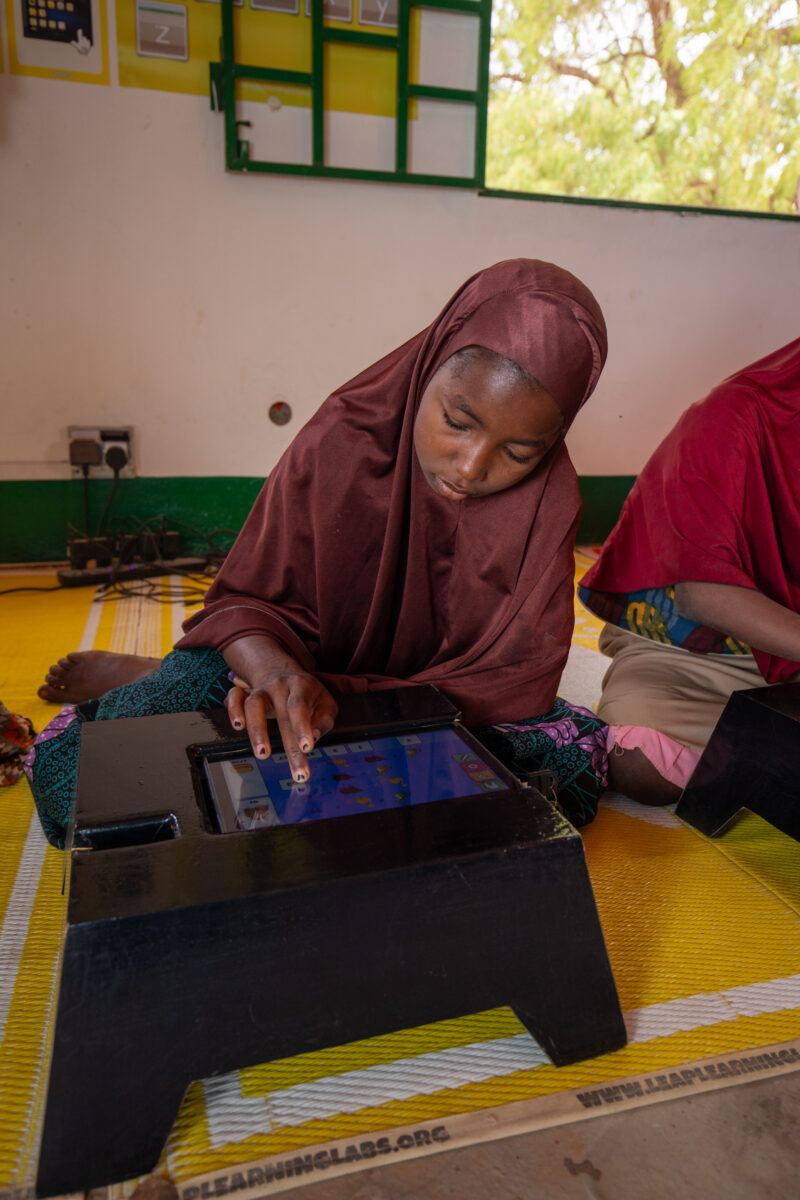 Computer Class in Niger — Young students in Niger learn computer skills on tablets provided to their school by Norway. — Africa, Education, Eyes Closed, Fema...