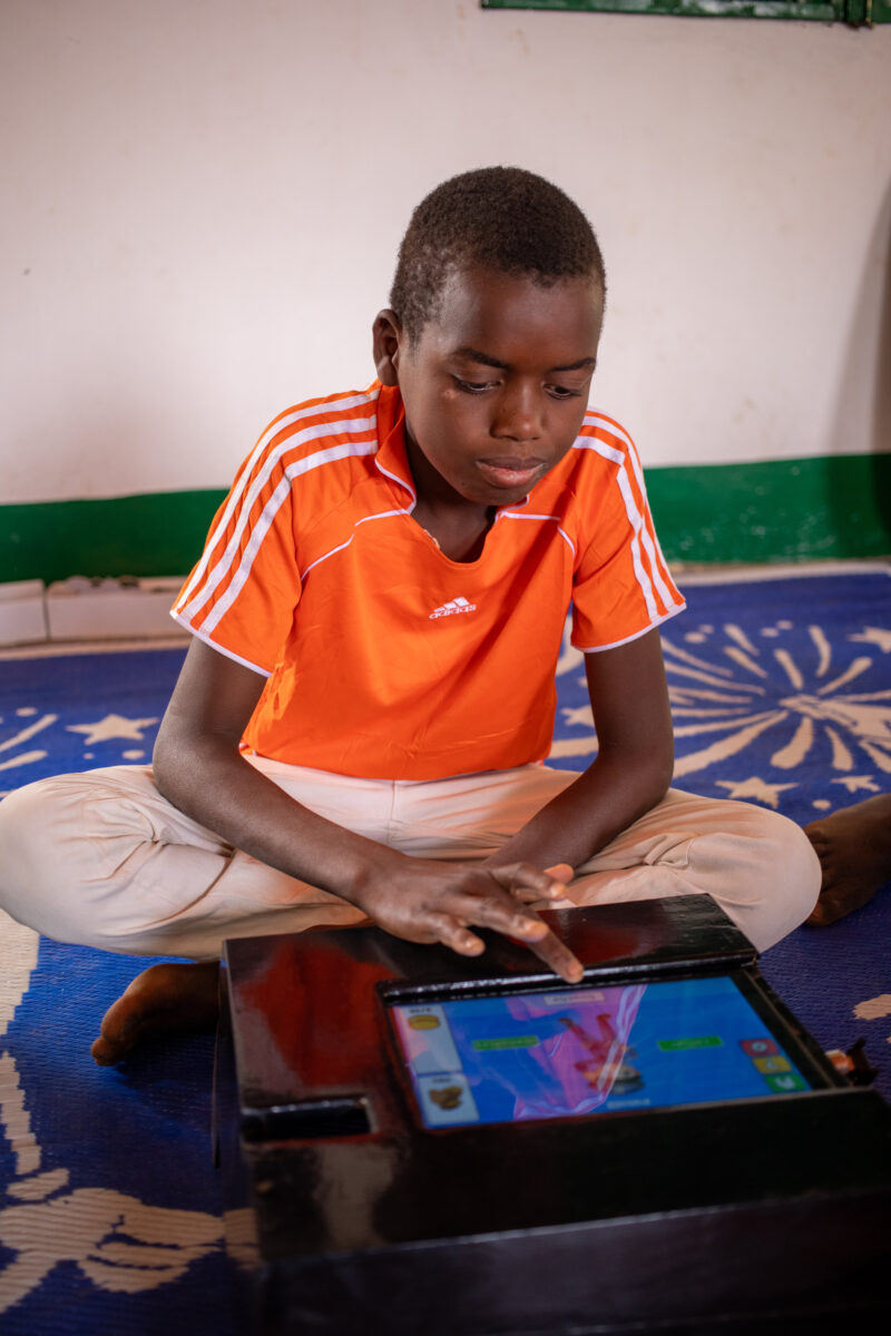 Computer Class in Niger — Young students in Niger learn computer skills on tablets provided to their school by Norway. — Africa, Education, Eyes Open, Fronta...