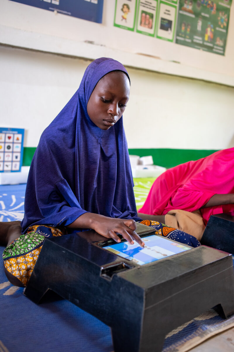 Computer Class in Niger — Young students in Niger learn computer skills on tablets provided to their school by Norway. — Africa, Child, Education, Eyes Close...