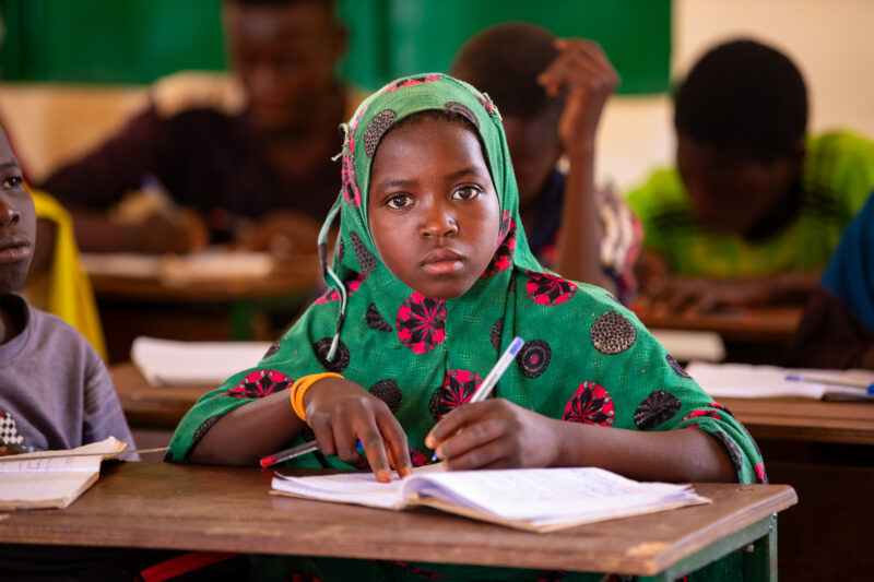 Girl in Niger Attends School — With a long tradition of early marriage, most girls in Niger drop out of school after the second grade — Africa, Child, Educat...