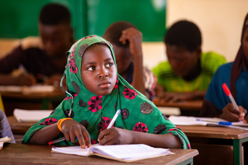 Girl in Niger Attends School — With a long tradition of early marriage, most girls in Niger drop out of school after the second grade — Africa, Child, Educat...