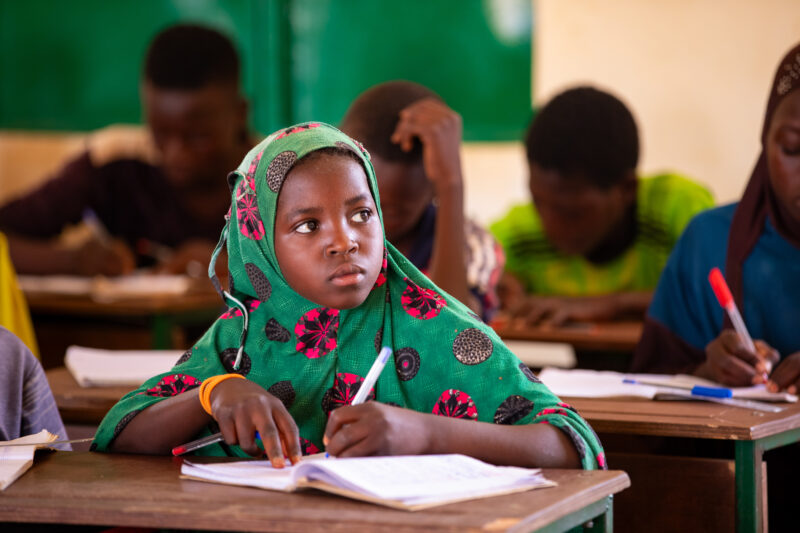 Girl in Niger Attends School — With a long tradition of early marriage, most girls in Niger drop out of school after the second grade — Africa, Child, Educat...
