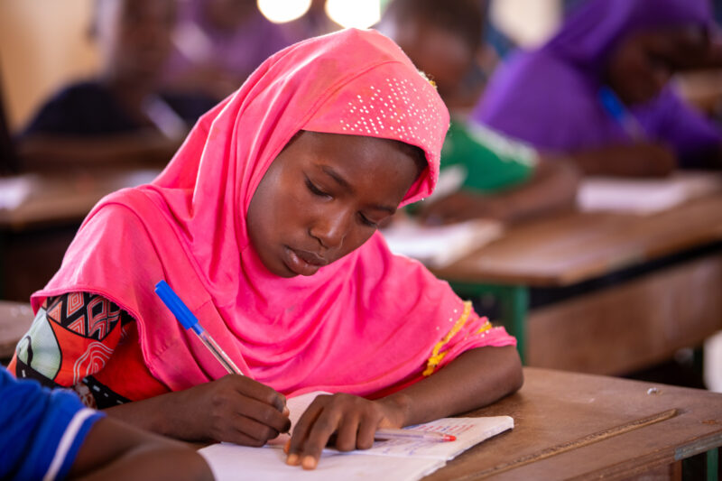 Girl in Niger Attends School — With a long tradition of early marriage, most girls in Niger drop out of school after the second grade — Africa, Child, Educat...