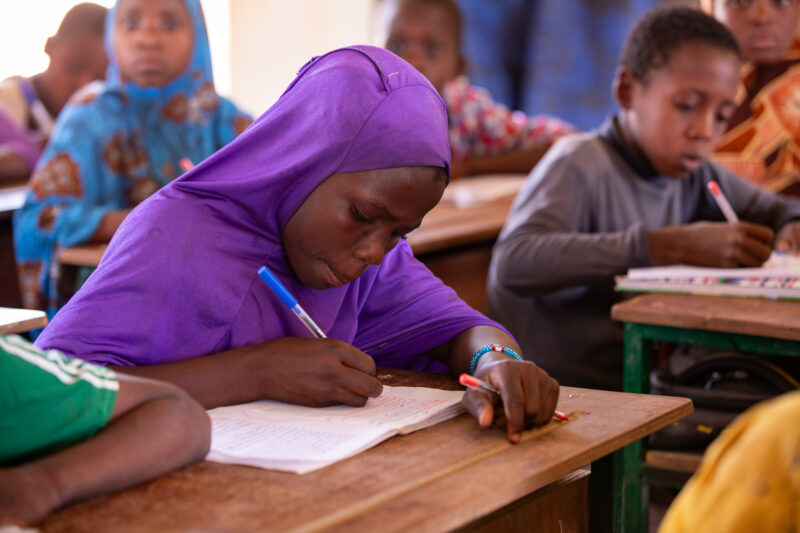 Girl in Niger Attends School — With a long tradition of early marriage, most girls in Niger drop out of school after the second grade — Africa, Child, Educat...