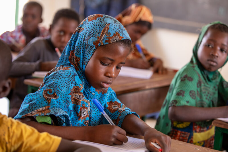 Girl in Niger Attends School — With a long tradition of early marriage, most girls in Niger drop out of school after the second grade — Africa, Child, Educat...