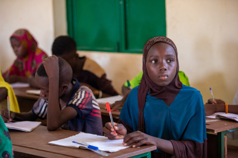 Girl in Niger Attends School — With a long tradition of early marriage, most girls in Niger drop out of school after the second grade — Africa, Child, Educat...