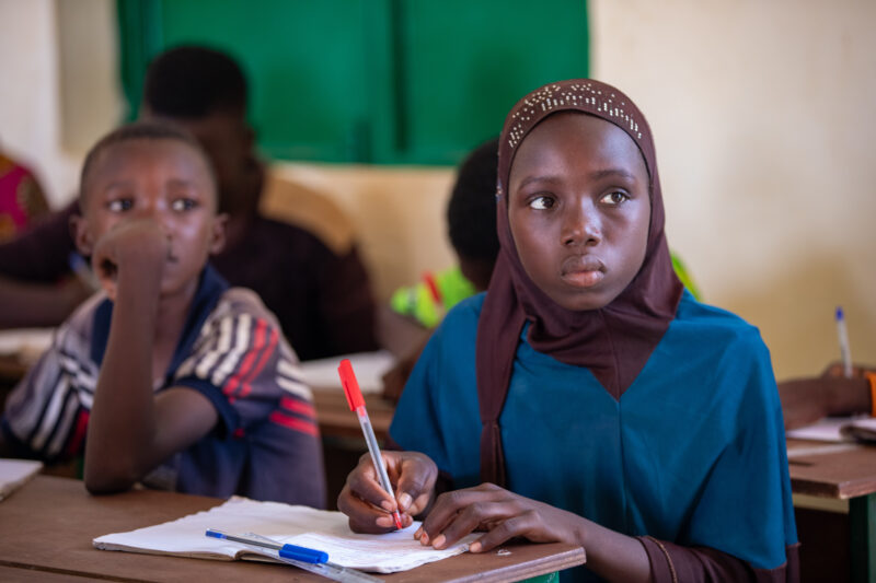 Girl in Niger Attends School — With a long tradition of early marriage, most girls in Niger drop out of school after the second grade — Africa, Child, Educat...
