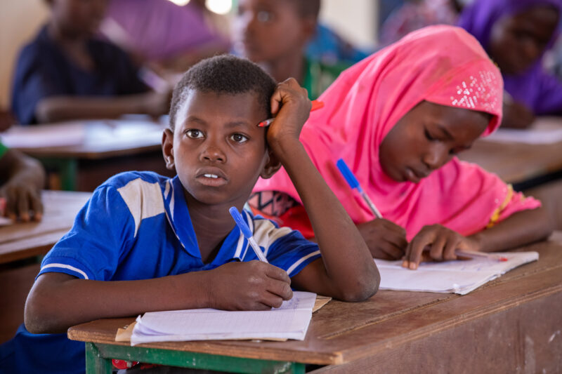 Boy in School in Niger — Young boy attends school in Niger, Africa — Africa, Child, Education, Eyes Open, Frontal Face