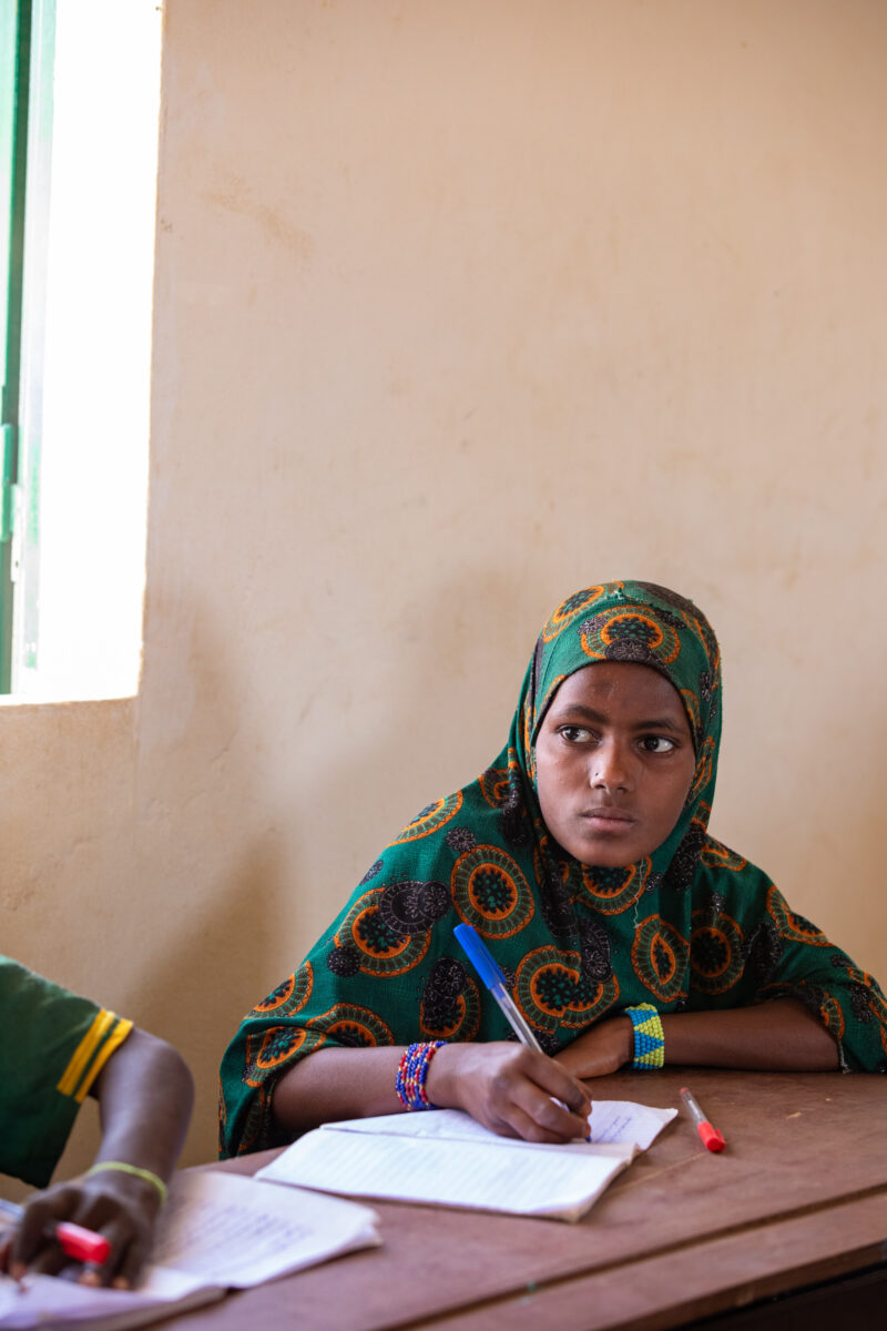 Girl in Niger Attends School — With a long tradition of early marriage, most girls in Niger drop out of school after the second grade — Africa, Education, Ey...