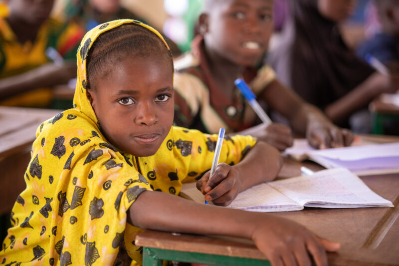 Girl in Niger Attends School — With a long tradition of early marriage, most girls in Niger drop out of school after the second grade — Africa, Child, Educat...