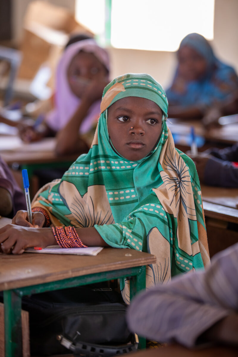 Girl in Niger Attends School — With a long tradition of early marriage, most girls in Niger drop out of school after the second grade — Africa, Child, Educat...