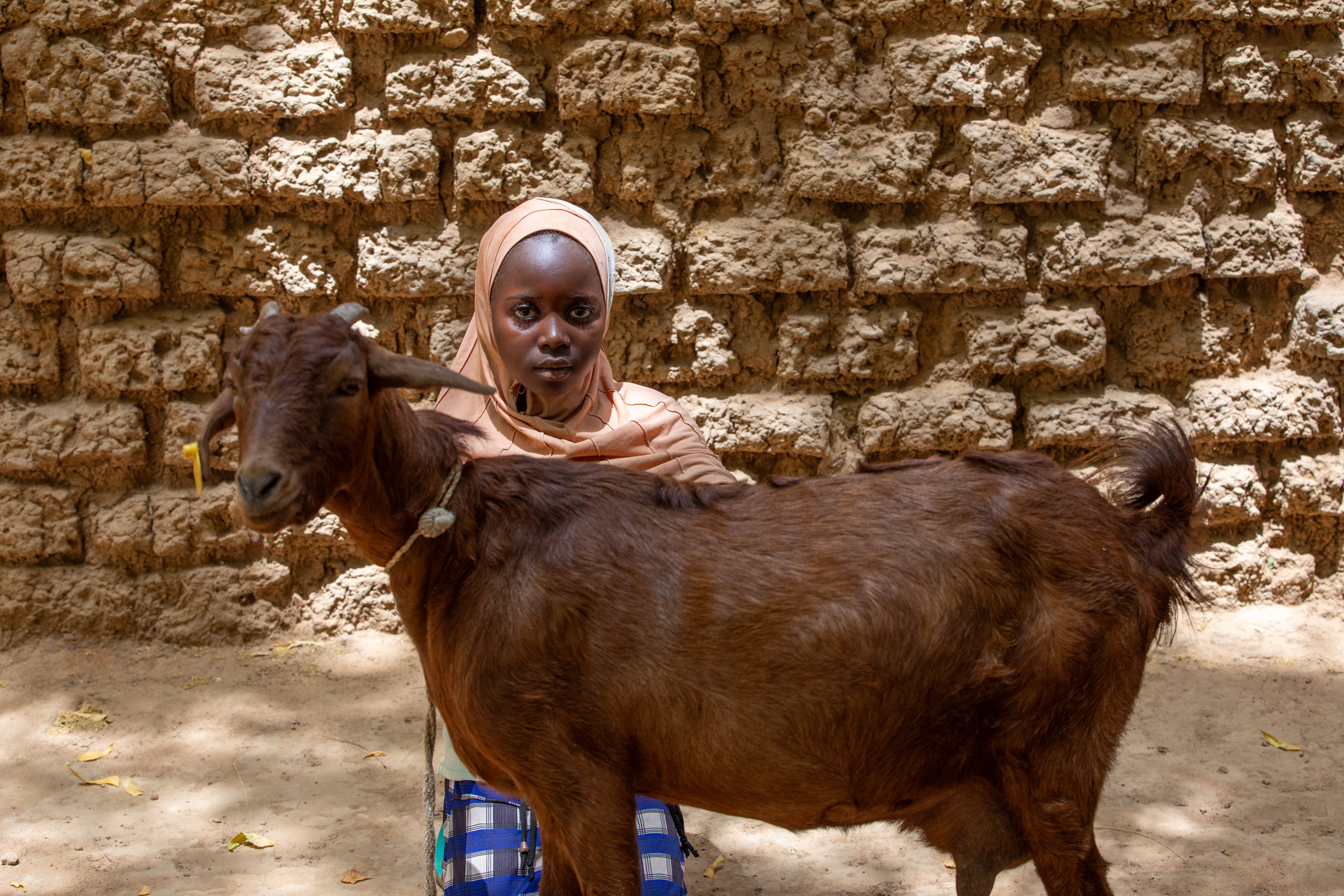Girl and her Goat in Niger
