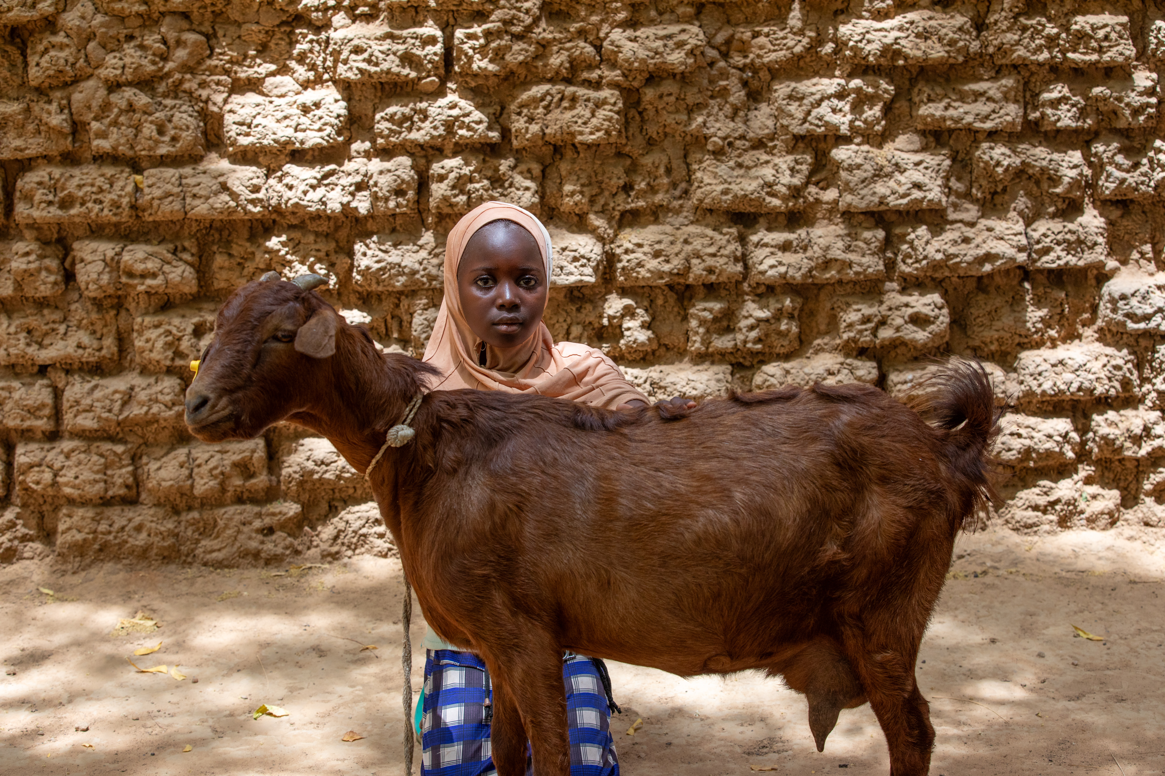 Girl and her Goat in Niger
